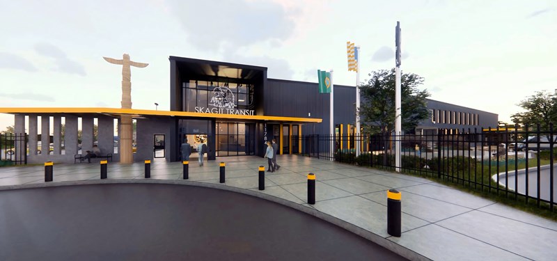 Rendering of Maintenance, Operations and Administration facility planned for Burlington, WA. Individuals shown walking in and out of the entrance to the building.